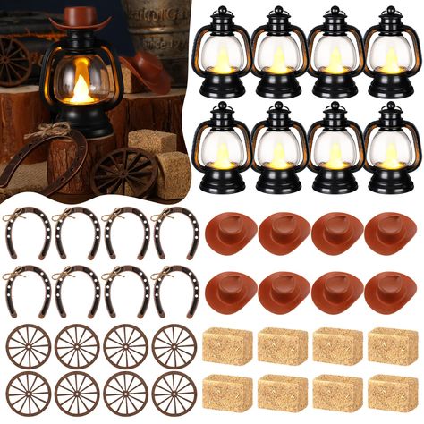 PRICES MAY VARY. Complete Western Themed Party Decorations Set: this collection consists of 60 combined sets of western cowboy theme party decorations; The package offers 12 mini lanterns, 12 mini cowboy hats, 12 mini horseshoes, 12 wagon wheels and 12 hay bales; This inclusive package will meet all your decorative needs, allowing for extra items to be stored for future use Delicate Western Cowboy Theme: our western theme centerpieces are suitable for those with a love for the west and cowboy cu Western Lantern Centerpieces, Western Theme Retirement Party, Cowboy Theme Party Centerpieces, Cowboy 1st Birthday Party Centerpieces, Western Christmas Centerpiece Ideas, Montana Themed Party, Western Theme Table Centerpieces, Stagecoach Birthday Party Ideas, Texas Themed Party Decorations