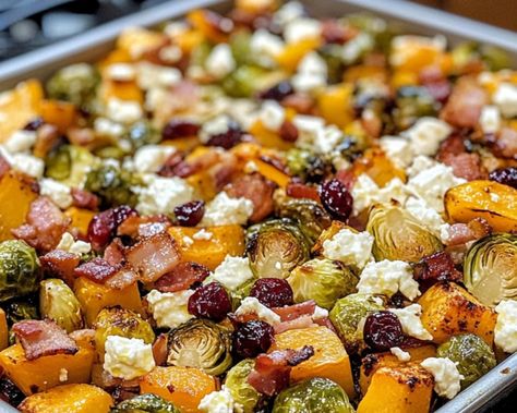 Discover the perfect fall side dish with roasted Brussels sprouts, butternut squash, bacon, cranberries, and feta. Roasted Brussel Sprouts And Butternut Squash With Bacon, Squash Cranberry Feta, Feta And Brussel Sprouts, Butternut Squash Brussel Sprouts Bacon, Brussel Sprouts With Feta Cheese, Roasted Vegetables With Feta, Recipe With Butternut Squash, Brussel Sprout Butternut Squash Recipe, Brussel Sprouts And Squash