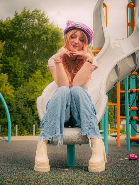 Playground Pose Ideas, Childish Poses, Senior Photos Unique, Playground Photoshoot Ideas, Playful Pose Reference, Wheelchair Photoshoot, Pup Photoshoot, Playground Shoot, Playground Photo Shoot