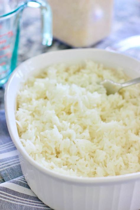 Oven Baked White Rice - Perfect Every Time! No more watching the pot or clumpy rice. Easy clean up, tender and cooked just right! Baked White Rice, Basmati Rice Recipes Easy, Oven Baked Rice, Rice Bake Recipes, Rice In The Oven, Basmati Rice Recipes, White Rice Recipes, Pork Chop Recipes Baked, Baked Rice