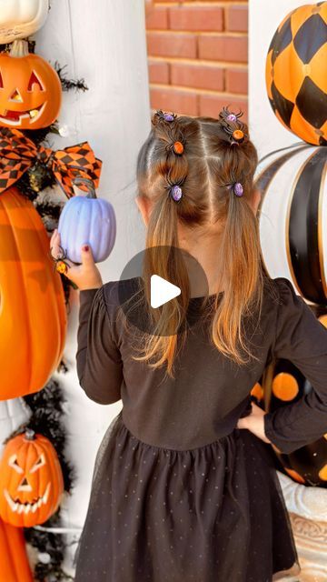 Lauren Vandiver Green on Instagram: "Spooky Spider Halloween Girls’ Hairstyle.🕷️✨ We used the cutest $1.25 plastic jewel spider rings from Dollar Tree for this easy spider bubble braid hairstyle, but you can use any plastic Halloween rings.💜🧡 It’s a simple no-braid braid that anyone can do. All you need are small rubber bands, plastic spider or Halloween rings, a comb to part hair and a clip to separate hair.🕸️ Step by step instructions below for this easy Halloween hair tutorial.

🕷️SPOOKY SPIDER BUBBLE BRAID STEPS:🕷️

1. Part hair down the middle. Secure one side with a clip.
2. Part a 2 inch section of hair at the top of one side and secure with rubber band.
3. Separate another 2 inch section below, add to top section and secure with rubber band.
4. Repeat until all hair in first Spider Ring Hair, Spider Hairstyle, Easy Halloween Hair, Halloween Hairstyles For Kids, Bubble Braid Hairstyle, Halloween Rings, Spider Rings, Spider Hair, Part Hair