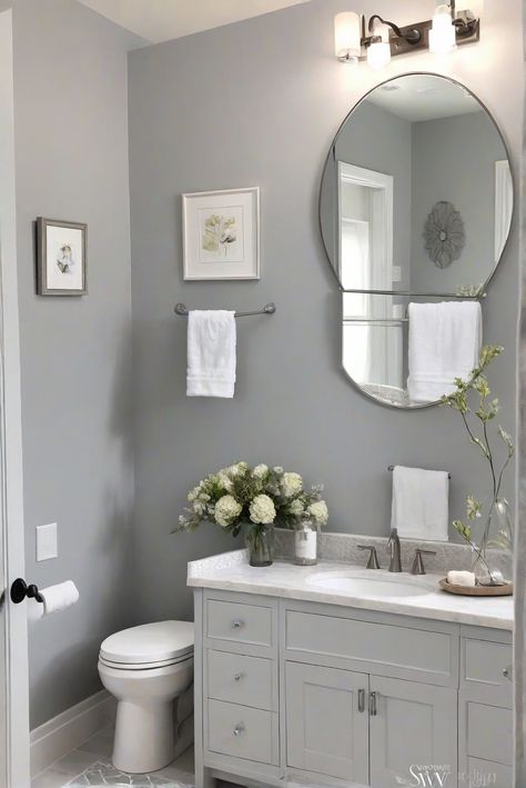 Unleash modern elegance with SW Light French Gray (0055) in your cozy bathroom. Transform your daily routine into a tranquil retreat with a touch of grace. #Ad #homedecor #homedesign #bathroom #Painthome interiorarchitecture best Wall Colors for Bathroom Colors Bright Room Colors best colors combinations bathroom bathroom Remodeling Modern Paint Colors 2024 Guest Bathroom Colors, Grey Powder Room, White Powder Room, Half Bath Design, Powder Room Wallpaper, Powder Room Vanity, Powder Room Decor, Wallpaper Inspiration, Small Bathroom Vanities