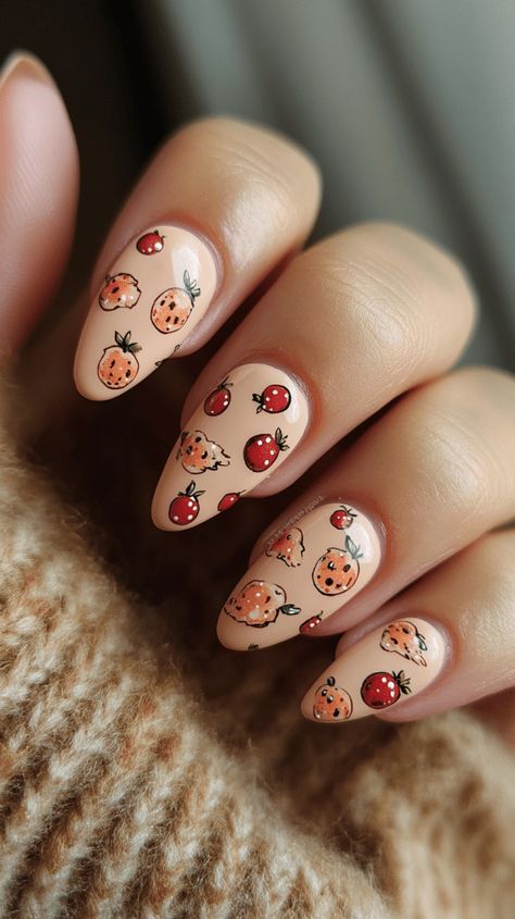 This playful Thanksgiving nail art features cute mini pumpkin pies and bright cranberries for a deliciously festive touch. Perfect for those who love a sweet and quirky look, this design blends autumn flavors with a fun, cartoony vibe. The soft nude background makes the illustrations pop, making it an ideal choice for any casual or family celebration. Get inspired to try this cute and tasty manicure for your holiday festivities! Cranberry Nails, Nude Background, Trendy Manicure, Festive Nails, Thanksgiving Nail Designs, Festive Manicure, Thanksgiving Nail Art, Thanksgiving Nail, Mini Pumpkin Pies