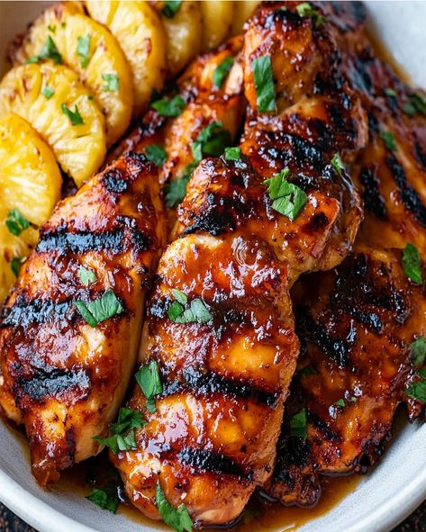 Make this Hawaiian Grilled Chicken with Pineapple Glaze recipe for a delicious, sweet-savory meal perfect for grilling or a tropical-themed Chicken With Skin On Recipes, Hawaiian Grilled Teriyaki Chicken, Healthy Hawaiian Chicken, Savory Pineapple Recipes, Grilled Chicken With Pineapple, Pineapple Chicken Breast, Hawaiian Grilled Chicken, Traditional Hawaiian Food, Tropical Chicken