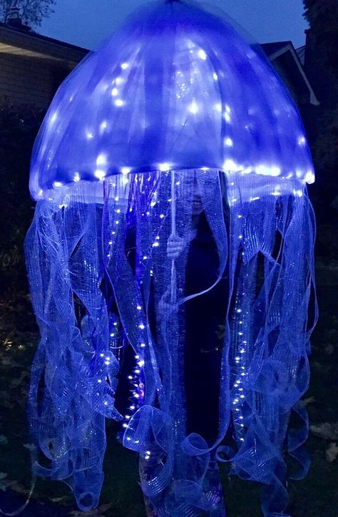 DIY Jellyfish Umbrella Costumes: Craft Aesthetic & Design Inspiration Water Costume Ideas, Jellyfish Costume Umbrella, Jellyfish Costumes, Jellyfish Outfit, Jellyfish Costume Diy, Jellyfish Umbrella, Jellyfish Halloween Costume, Umbrella Jellyfish, Jellyfish Halloween