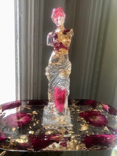 This custom colored piece works as a ring and trinket tray, piece for your altar, soap dish, just as decor, and more! The statue of Aphrodite and tray are full of real dried flowers, chips of different crystals and gemstones, or gold, silver, and rose gold flakes according to the color palette chosen! Aphrodite Mini Statue, Aphrodite And Persephone, Altar To Aphrodite, Aphrodite Decor, Aphrodite Altar Aesthetic, Aphrodite Altar Ideas, Aphrodite Photoshoot, Daughter Of Aphrodite Aesthetic, Venus Altar