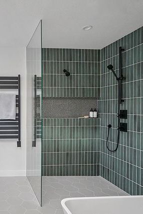 If you're thinking about incorporating a wet room into your home, you'll want to take a look at these 15 spaces which are full of design inspiration. #wetroomideas #bathrooms #apartmentliving #smallspacedecorating #thespruce Bath And Shower Wet Area, Modern Luxury Ensuite Bathroom, Spa Wet Room, Green Wet Room, Japanese Wet Room, Master Bath Wet Room Layout, Narrow Wet Room, Wet Room Tiles Ideas, Wetroom Ideas Small Wet Rooms