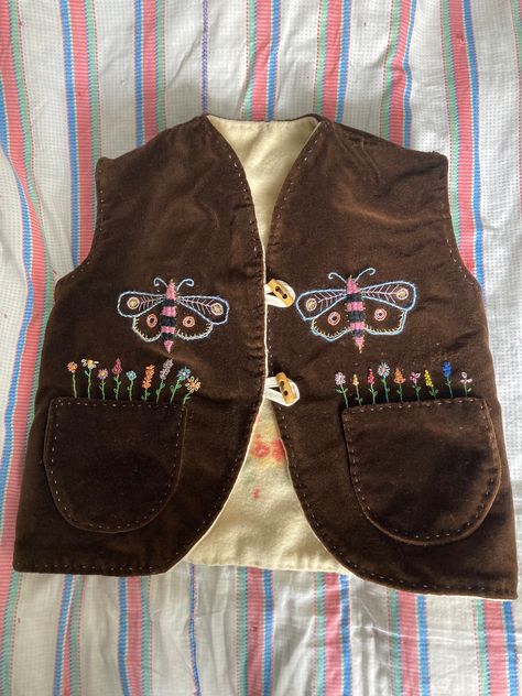 handmade embroidered waistcoat using recycled fabrics . measures armhole 17 inches circumference . pit to pit 18 inches ,length 17 inches . fully lined with recycled vintage blanket . Vintage Custom Clothes, Patch Work Outfits, Things To Thrift, Quirky Fashion Vintage, Recycled Outfit, Embroidered Waistcoat, Recycled Clothes, Colorful Vest, Embroidered Vest