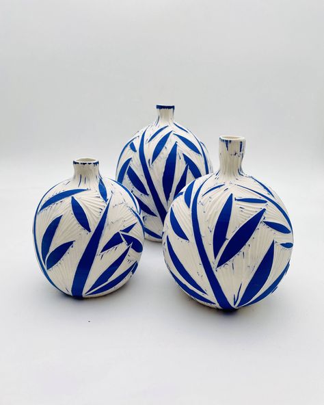 This marvelous modern blue and white vase set will make an exciting housewarming or hostess gift.
Get it to upgrade your table, shelf, living, or dining room with contemporary ceramic decor and beautiful colors!

⋆ Measurements of each vase:
Small vase:
Height: approx. 10 cm (3.94" inches)
Medium vase:
Height: approx. 13cm (5.12" inches)
Large vase:
Height: approx. 16 cm (6.3" inches) Ceramic Shelf, Sgraffito Technique, Blue And White Vase, Decor Shelf, Vase Ceramic, Pottery Gifts, Ceramic Bottle, Handmade Vase, White Pottery