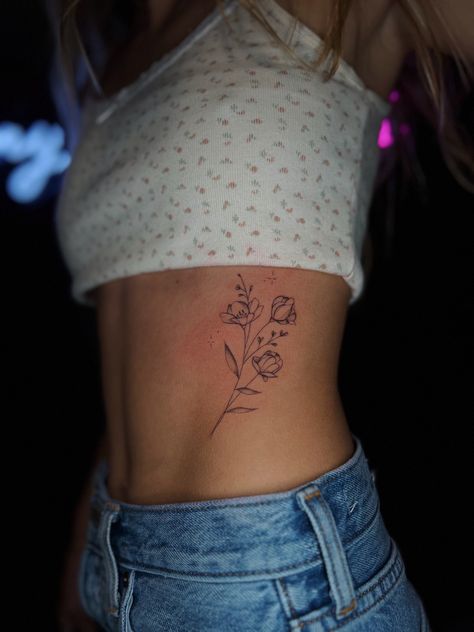 February Flower Butterfly Tattoo, Where To Put A Flower Tattoo, Side Body Flower Tattoo, Good Places To Get Flower Tattoos, Floral Rib Cage Tattoos For Women, Waist Flower Tattoo For Women, Tats On Ribs, Flower Tattoos Delicate, Tattoo Placement Ideas Flowers