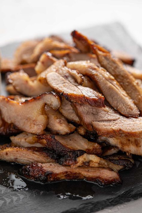 This Thai style grilled pork neck or grilled pork jowl is super DELICIOUS and easy to make. Pair it with sticky rice and nam jim jaew (Thai chili dipping sauce) and I guarantee that you’ll be satisfied! #thaigrilledporlneck #thaigrilledporkjowl #grilledpork #thaifood #thairecipe #kormooyang #kormooyaang #isanfood #namjimjaew #stickyrice #thaichilisauce #อาหารอีสาน #อาหารไทย #คอหมูย่าง #น้ำจิ้มแจ่ว Pork Neck Recipe, Chili Dipping Sauce, Thai Chili, Sticky Rice, Pork Chop Recipes, Grilled Pork, Pork Dishes, Easy Dishes, Grilled Meat