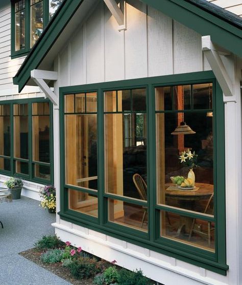 Did you know that Jeld-Wen offers tax credits for window replacements? Check out your options here #windows #taxes House With Green Trim, Casement Windows Exterior, Replace Exterior Door, Exterior Door Trim, Outside View, Black Shutters, Green Windows, Window Trim Exterior, Cabin Exterior