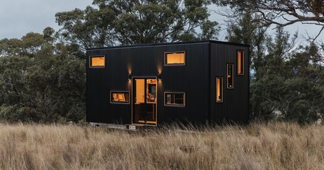 Hartley tiny house fits family of four under one small roof Small Desk Area, Kitchen Technology, Double Glass Doors, Metal Cladding, A Family Of Four, Duplex Apartment, Apartment Architecture, Small Deck, Family Of Four