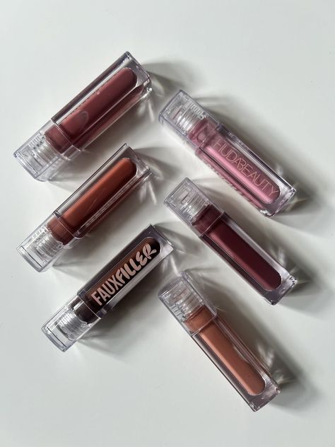 Huda Beauty Faux Filler Lip Gloss, Huda Beauty Lip Gloss, Trendy Lip Gloss, Huda Beauty Lip, Huda Kattan, Laneige Lip Sleeping Mask, Makeup Photography, Dry Lips, Setting Powder