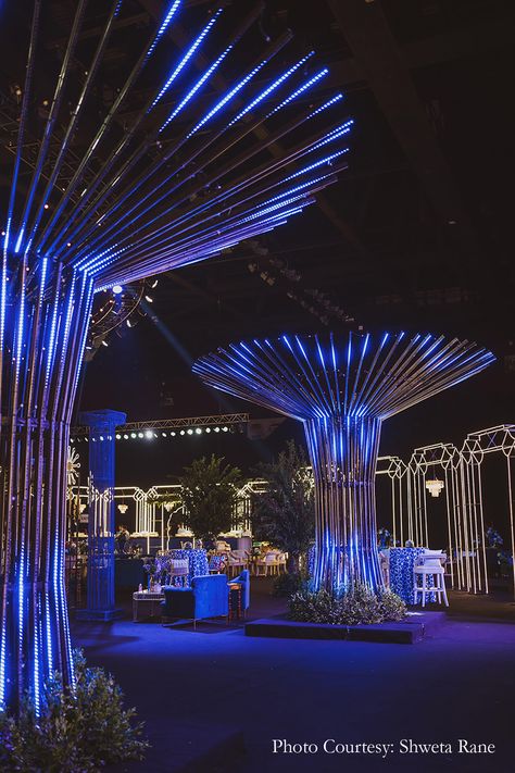 Larger-than-life with stunning LED installations and a retro vibe, this couple’s sangeet set the bar high with its elegance and glamour Led Stage Design Events, Event Set Up Ideas, Sangeet Theme Ideas, Sangeet Setup, Unique Event Decor, Amazing Wedding Ideas, Sangeet Decor, Event Entrance, Glamour Wedding