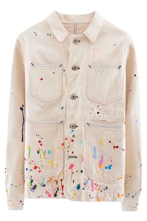 BANDULU SPLATTERED JACKET Heavyweight off-white jacket with hand-embroidered paint splatter embellishment. Embroidered logo and iguana on back. Four pockets. Dry clean only. 100% cotton.   $1100 BANDLULU Under the direction of artist Pat Peltier, Bandulu takes quality, vintage clothing and re-envisions them through intricate hand embroidery and exquisite detailing like embroidered paint splatter.: Paint Splatter Embroidery, Paint Splatter On Clothes, Paint Splatter Clothes, Embroidery On White Shirt, Paint On Jacket, Paint Embroidery, Hand Painted Clothes, Hand Painted Logo, Men Mode