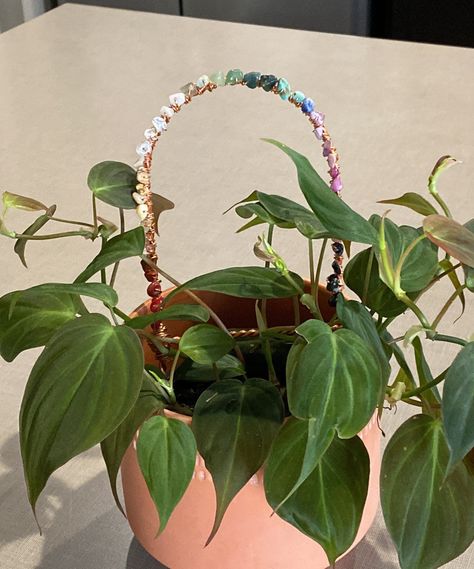 "Perfect gift for a plant lover, houseplant collector, someone who loves gemstones.  These handmade gemstone and metal plant trellises measure roughly 6\" in width and height excluding stakes.  The stakes are coated in plasti-dip to avoid corrosion of metal into the soil when the plants are watered.  These are perfect for small climbing plants, such as Hoya, Pothos, or philodendrons.  Each one will vary as far as gemstone color and sizes but will have this color scheme" Houseplant Accessories, Plant Stakes Diy, Plant Trellis, Plant Accessories, Plant Crafts, Plant Jewelry, Plants Are Friends, Trellis Plants, Summer Plants