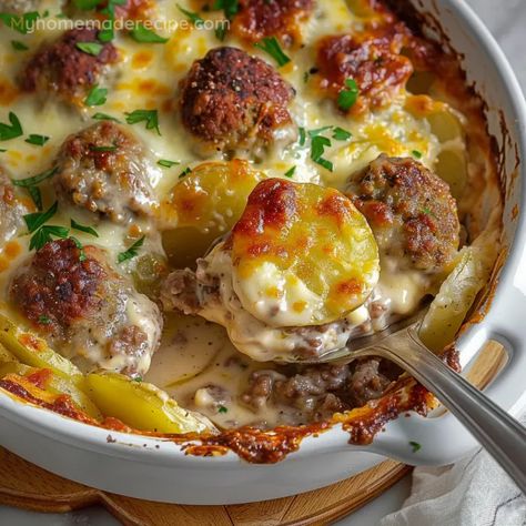 This Meatballs with Potatoes and Cheese recipe combines juicy meatballs, tender potatoes, and a rich bechamel sauce topped with melted mozzarella. A perfect one-pan meal for family dinners. Potatoes With Meatballs And Cheese, Meatballs Potatoes And Cheese, Meatball And Potatoes Casserole, Meatballs In A Blanket, Mash Potatoes And Meatballs, Meatballs Recipe Bbq, Meat And Potatoes Meals, Meatball And Potato Casserole, Meatball Mashed Potato Casserole