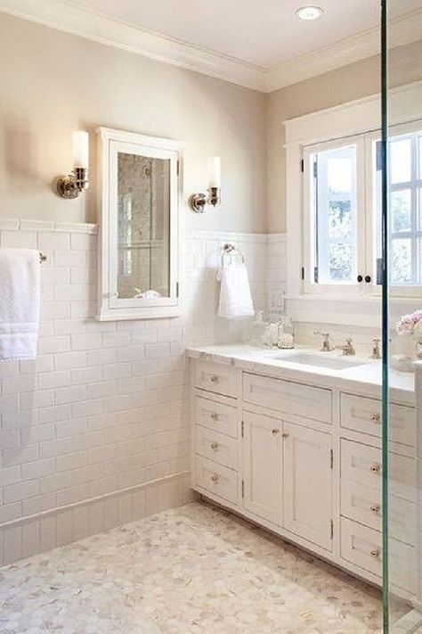 Warm creamy white bathroom painted Atrium White (Benjamin Moore). #paintcolors #whitepaintcolors #atriumwhite White Bathroom Colors, Bathroom Colors Gray, Best Bathroom Colors, Painting Bathroom Cabinets, White Bathroom Cabinets, Bathroom Color Schemes, White Window, Revere Pewter, Bathroom Paint Colors