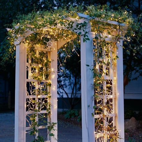 CSH902039_08192005 Obelisk Trellis, Arbors Trellis, Outside Christmas Decorations, Christmas Light Installation, Hanging Christmas Lights, Outdoor Trellis, Wedding Decoration Ideas, Garden Arbor, Wooden Pergola