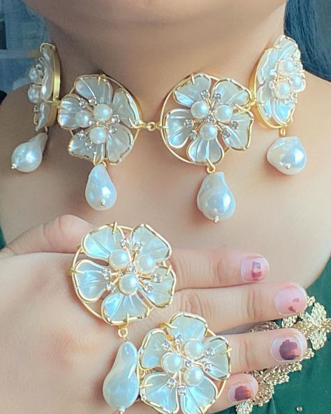 High quality mother of pearl necklace sets ❤️❤️ DM for prices, shipping free within India . Product code on website : MOP . 🌟To place an order DM or whatsapp us on +916280926290 OR 🌟Buy it directly on our website www.rohikastore.com. Search for the product with the keyword “MOP” . . . Follow @jewellery_by_rohika for more designs.❤️ . We ship worldwide 🌍 . We customise happiness 💞 . . Ordering procedure : - Make payment through Gpay, phonepe or bank transfer (net-banking) - Share payment s... Luxury Pearl Chain Jewelry In Mother Of Pearl, Luxury Mother Of Pearl Necklace, Luxury Meenakari Pearl Necklace For Festivals, White Flower-shaped Mother Of Pearl Jewelry, Luxury Mother Of Pearl Flower-shaped Jewelry, Placing An Order, Pearl Necklace Set, Necklace Sets, Mother Of Pearl Necklace