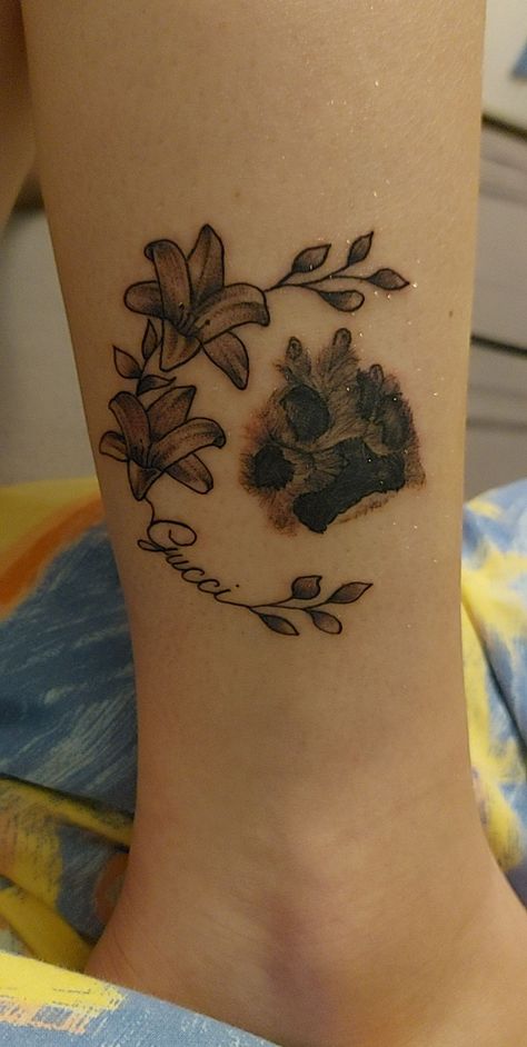 Dog tattoo, flower Dog Pawprint Tattoo With Flowers, Paw Prints With Flowers Tattoo, Dog Paw Flower Tattoo, Dog Paw Tattoo With Flowers, Flower Paw Print Tattoo, Paw Print With Flowers Tattoo, Paw Print Tattoo With Flowers, Floral Paw Print Tattoo, Paw Print Flower Tattoo