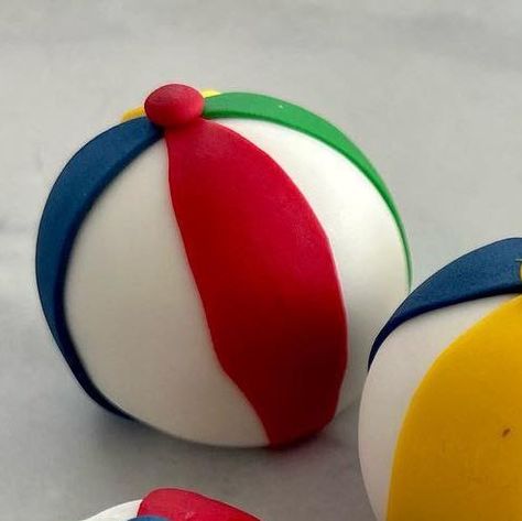 My Artisan Bakery on Instagram: "Any summer plans? ⛱️🏝️🏄‍♀️ Beach ball fondant toppers and cookies @myartisanbakery #myartisanbakery #myartisanbakerycookies #myartisanbakerytoppers #etsyshop #etsy #etsyseller #etsystore #creativescommunity_ #shopsmall #makeitmeaningful #madewithlove #handmade #handmade_hour #customtopper #beachballtopper #beachballcake #beachballparty #beachballcookies www.myartisanbakery.com https://www.etsy.com/shop/myartisanbakery" Beachball Cake, Beach Themed Cake Pops, Cake Pops Beach Theme, Fondant Beach Ball, Beach Fondant Cake, Artisan Bakery, Fondant Tutorial, Beach Ball, Fondant Toppers