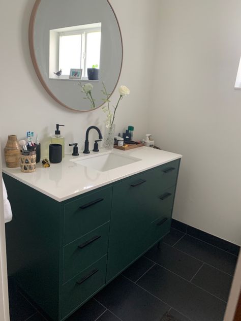 Green Vanity Black Floor, Green Bathroom Vanity Black Floor, Black Hexagon Tile Bathroom Floor Green Vanity, Black Tile Floors, Black Hexagon Tile Bathroom Floor, Green Cabinets Bathroom, Mountain Bungalow, Black Hexagon Tile Bathroom, Black Tile Bathroom Floor