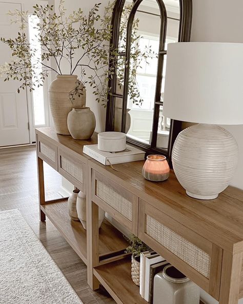 Spring Stills featuring some console table styling. 🌿 #homedecor #livingroom #office #entryway #neutralhomedecor #homeinspo #organicmoderndecor #InteriorInspiration #HomeDesign #InteriorStyling #ModernHome #DecorInspiration #NeutralPalette #MinimalistDecor #HomeStyle #DesignInspo #ContemporaryLiving #DecorGoals #HomeInteriors #ChicLiving #SimpleElegance #DecorTrends #StyledSpaces #ModernLiving #HomeDecorIdeas #InteriorDecorating #HomeStylist Console With Two Lamps, Rustic Entryway Table Decor, Small Coastal Entryway Ideas, Entryway Table Styling Ideas, Entry Way Dining Room Combo, Entryway Ideas Aesthetic, Modern Farmhouse Console Table Decor, Organic Modern Office Decor, Entryway Ideas Coastal