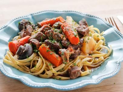 Slow-Cooker Sunday Stew Recipe over butter lemon noodles | Ree Drummond | Food Network Recipe Beef Stew, Slow Cooker Sunday, Beef Stew Meat, Ree Drummond, The Pioneer Woman, Beef Stew, Pioneer Woman, Stew Recipes, Recipes Food