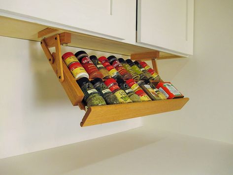 PRICES MAY VARY. Makimoo Kitchen Storage Under Cabinet Mounted Spice Rack holds 16 large or 32 small spice containers. Easy to Use. Measures 19 1/2" wide, 10" deep x 2 3/4" high. Offered in light Colonial Maple. Two rows of storage for spice bottles up to five inches tall. Folds up and securely latches in place under your upper kitchen cabinets freeing up valuable counter and cabinet space while keeping your spices organized and handy. Easy to install with the 4 furnished screws, step by step in Cookbook Storage On Counter, Kitchen Electronics Storage Shelves, Cool Kitchen Gadgets Storage, Top Refrigerator Storage Rack, Spice Cabinet Pull Out Alcove, Lower Cabinet Organizers, Organize Shelf Spices, Small Jar Storage, Small Container Storage