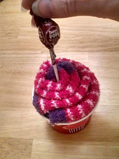 Must Run in the Family: Fuzzy Sock Cupcakes Sock Cupcakes Christmas, Socks Ideas Gift, Sock Cupcakes Diy How To Make, Fuzzy Socks Christmas Gift Ideas, How To Wrap Socks As A Gift, Cute Gifts For Birthday, Fuzzy Sock Cupcakes, Christmas Party Games For Groups, Cozy Socks Gift