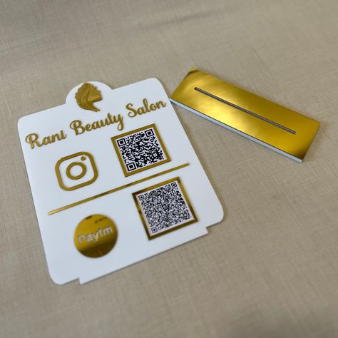 This compact, adjustable Quick Response acrylic stand is made of high-quality gold and white acrylic sheet and has a striking design that allows it to be put anywhere. A quick scan of this QR code stand will take your customers to your page in an instant. WhatsApp us at +91 8591747642 and get your customized QR code scanner delivered to your doorstep. The dimension of this product is 6 by 7 inches. #love #beautiful #acrylic #art #acrylicsigns #nameplatesforflats #nameplatesforhome Qr Code Stand, White Acrylic Sheet, Qr Scanner, Qr Code Scanner, Name Plates For Home, Acrylic Stand, Acrylic Sheets, White Acrylic, Acrylic Art