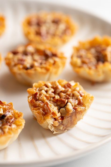 Mini Pecan Phyllo Tarts, Phyllo Shell Recipes, Bite Size Pies, Philo Dough, Pecan Pie Tarts, Pecan Bites, Filo Pastry Recipes, Pecan Pie Bites, Phyllo Recipes