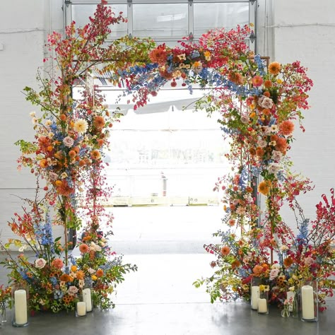 Elaborate Wedding Florals, Colorful Wedding Chuppah, Whimsical Wedding Arbor, Floral Arch Colorful, Wedding Arch Colourful, Fall Color Flowers Wedding, Wedding Flowers On Arch, Cool Reception Ideas, November Floral Wedding