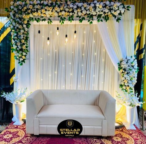 Simple Stage Decorations For Engagement At Home, Simple Stage Decorations Wedding Indian, Engagement Stage Decoration Indian Simple, Engagement Decorations Indian Simple, Engagement Background Decoration, Simple Wedding Stage, Engagement Decorations Indian, Stage Background Decoration, Haldi Backdrop