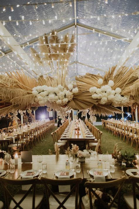 Luxury organic wedding tablescape with hanging floral decor on a clear tent| Pampas grass wedding reception decor for the Boho Glam Bride  - Photography: Shane Shepherd #table #tablesetting #tablescape #tabledecor #centerpieceideas #weddingdecor #weddingdecorations Filipiniana Wedding Reception, Boho Filipiniana Wedding, Pampas Grass Wedding Reception, Filipiniana Wedding Theme Reception, Rustic Boho Wedding Reception, Hanging Floral Decor, Filipiniana Wedding Theme, Boho Glam Wedding, Filipiniana Wedding