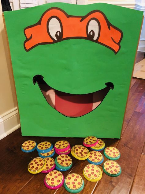 Ninja turtle pizza toss! Ninja Turtle Birthday Party Games, Ninja Turtle Theme Party Decor, Ninja Turtle Birthday Games, Ninja Turtle Party Decor, Ninja Turtles Birthday Party Ideas Games, Ninja Turtles Trunk Or Treat, Ninja Turtle Desserts, Ninja Turtle Party Activities, Ninja Turtle Birthday Party Ideas