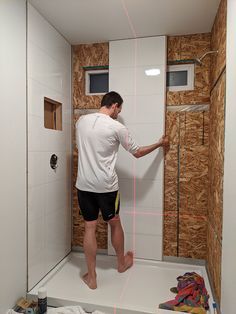 Step 2 DIY laminate shower wall panel installation | Innovate Building Solutions | #LaminateWallPanels #ShowerWallPanel #BathroomRemodel Laminate Wall Panels, Diy Tile Shower, Makeover Kamar Mandi, Shower Remodel Diy, Bathroom Shower Panels, Tub To Shower Conversion, Shower Conversion, Shower Renovation, Laminate Wall