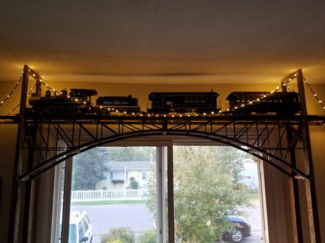 Train Track Around Room Ceilings, Model Train Around Ceiling, Train On Ceiling, Model Train Display Ideas, Model Train Room, Train Display Shelves, Train Station Bedroom, Ceiling Train Track, Train Display Ideas