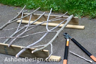 Ashbee Design: Hide That Grill • DIY Grill Screen Fence Out Of Branches, Twig Fence Diy, Branch Fence Diy, Branch Fence Ideas, Diy Fence Gate, Branch Railing, Branch Fence, Large Glass Doors, Wood Fence Ideas