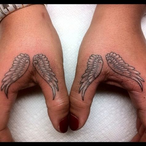 Angel wing hand tattoo @ high voltage (LA Ink) I love this design for angel wings and it looks small enough to fit were I want it :) Angel Wing Tattoo, Angel Wings Tattoo, Wing Tattoo, Wings Tattoo, Tattoo On, Angel Wings, Angel, Tattoos