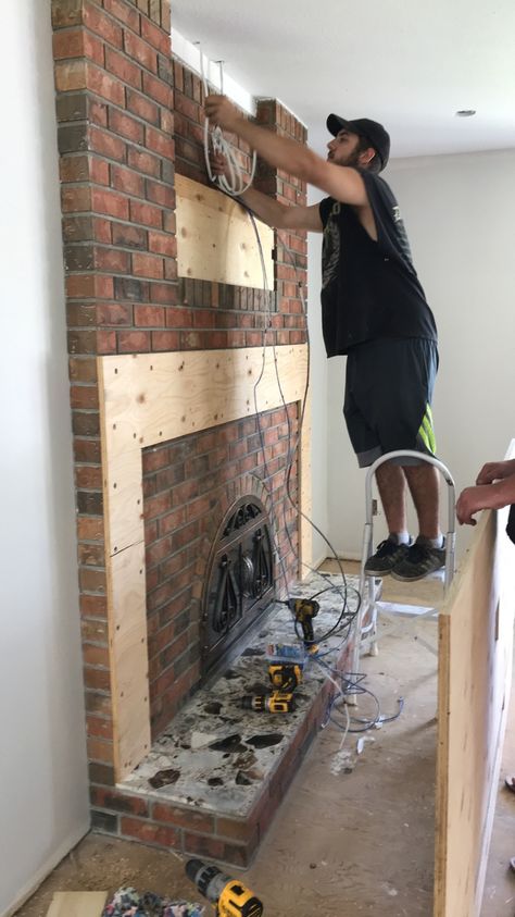 Fireplace Upgrade | House & Crown Panel Over Brick Fireplace, Arched Fireplace Opening, Recessed Brick Fireplace, How To Install Shiplap Over Brick Fireplace, Two Tone Brick Fireplace, Mantle Over Brick Fireplace, Drywall Over Brick Fireplace, Fireplace Refacing Ideas, Rebuild Fireplace