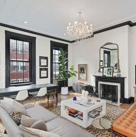 White walls, black trim, wood floor White Walls Black Trim, Bedroom White Walls, Black Baseboards, Black Trim Interior, Install Crown Molding, Black Window Trims, Dark Trim, Off White Walls, Black And White Living Room