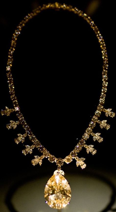 Victoria-Transvaal Diamond Necklace - Cut from a 240-carat rough stone found at the Premier Mine in Transvaal, South Africa, in 1951. The fancy “champagne-colored” diamond was originally cut to 75 carats but then later recut to 67.89 carats for better proportions. Mellow Yellow, Some Ideas, Colored Diamonds, South Africa, Diamond Necklace, Champagne, Stone, How To Wear, Color