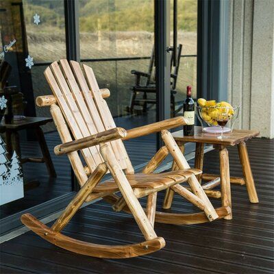 Loon Peak® Made of durable fir wood , the rocking chair constructed sturdy and stylish. The attractive fan high back and curved slatted seat provide the greatest comfort and support as you unwind after a hectic day at work. Just have a good relax on your front porch. Fir has characteristics very similar to cedar. Well known for its combination of stability and light weight, it is commonly used in furniture, both here and abroad. While being naturally weather-resistant, it may be further stained Chaise Lounge Living Room, Log Chairs, Lounge Patio, Wooden Rocking Chair, Patio Indoor, Wood Porch, Porch Chairs, Rocking Armchair, Rocker Chair