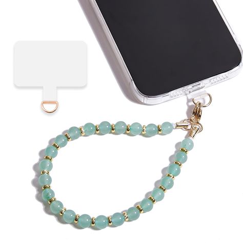 PRICES MAY VARY. Unique Design: Our phone wrist strap is crafted from pure natural stone beads, meticulously strung with durable thread and accented with 14K real gold electroplated metal between gemstones.Phone strap wrist ensures your phone stays secure yet easily accessible—a perfect solution for those needing quick phone access while keeping hands free. Multi-Functional: The wristlet for phone includes a versatile tether tab compatible with 90% of phone cases. Whether you're out clubbing, at Trendy Mobile Phone Wristlet For Everyday Use, Trendy Wristlet For Mobile Phone, Everyday Handheld Wristlet For Mobile Phone, Iphone Bracelet, Iphone Wrist Strap Beaded, Phone Bracelet, Phone Wrist Strap, Bracelet Stuff, Phone Wristlet