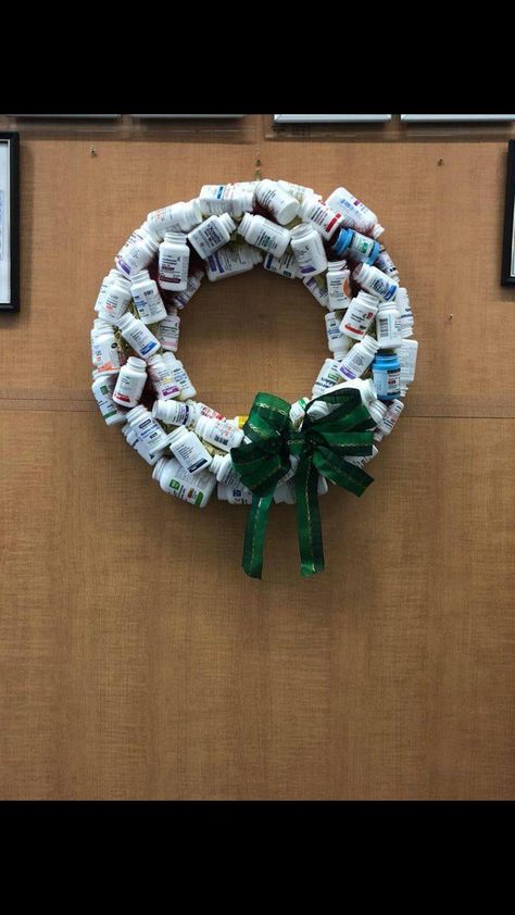 Pharmacy Wreath Ideas, Pill Bottle Wreath, Medical Christmas Door Decorations, Pharmacy Technician Graduation Cap Ideas, Pharmacy Christmas Tree, Pharmacy Wreath, Christmas Pharmacy Decorations, Pharmacy Christmas Decor, Vet Tech Week Gift Ideas Diy