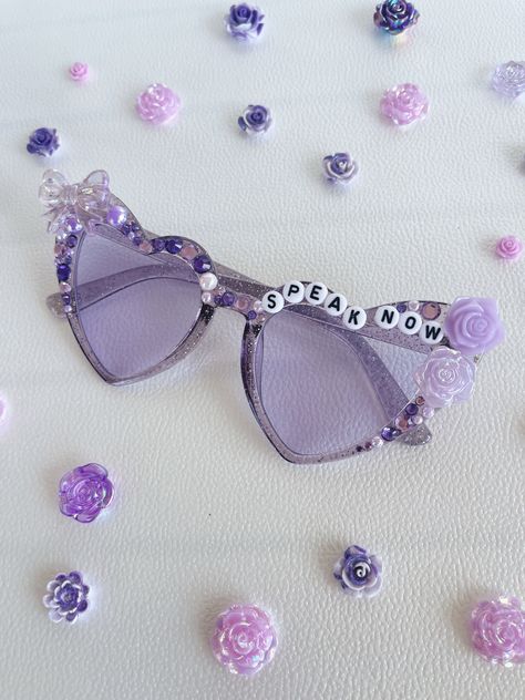 "Step into the fairy-tale world of the Speak Now era with these magical sunglasses. Channel your inner Swiftie and celebrate Taylor's lyrical storytelling. 💜🌌 #SpeakNowSunnies #SwiftieMagic #TaylorInspired" Eras Tour Outfits Ideas, Taylor Swift Speak Now Era, Revenge Fashion, Eras Tour Speak Now, Speak Now Eras Tour, Speak Now Aesthetic, Speak Now Taylor Swift, Now Aesthetic, Eras Concert