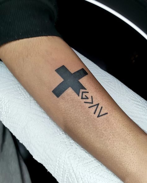 God Symbol Tattoo, Thigh Cross Tattoo, Christian Thigh Tattoos For Men, Highs And Lows Tattoo, Cross Tattoo On Forearm, Cross Forearm Tattoo Men, Christian Forearm Tattoo For Men, God Is Greater Tattoo, God Greater Than Highs And Lows Tattoo